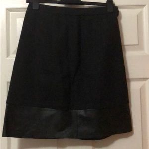 Wool skirt with leather trim